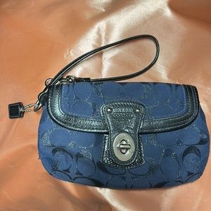 Navy blue Coach wristlet